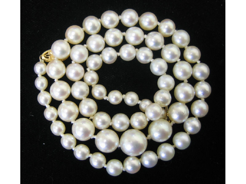 Appraisal: PEARL NECKLACE Graduated cultured pearl necklace mm - mm with