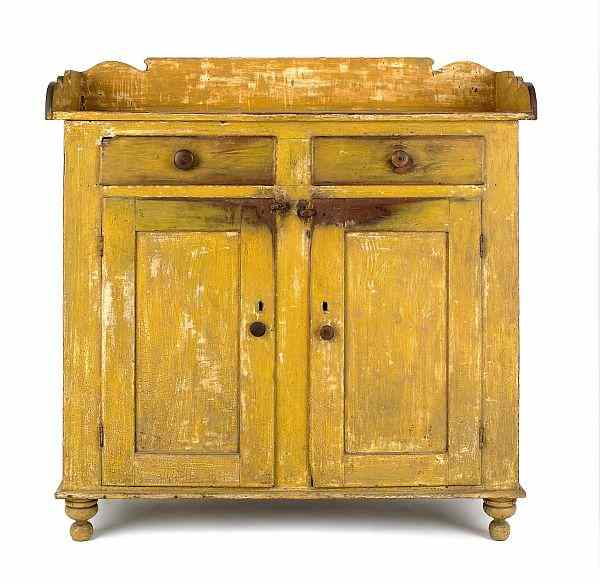 Appraisal: Pennsylvania painted poplar jelly cupboard ca retaining an old ochre