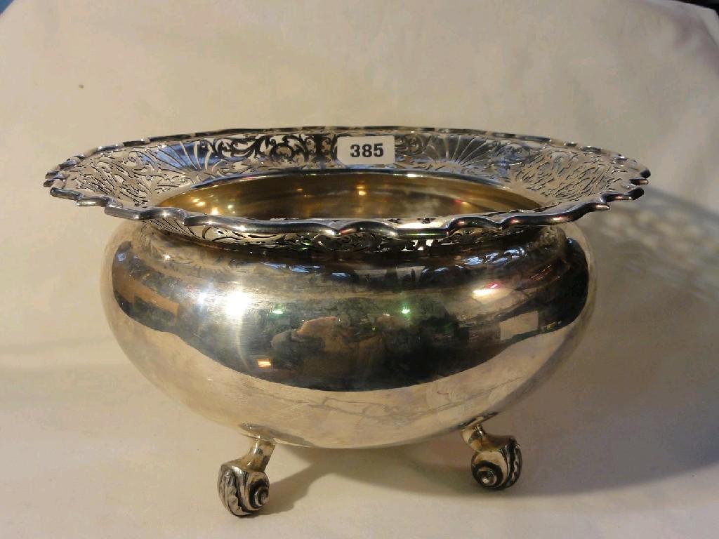 Appraisal: A substantial open silver bowl of baluster form on four