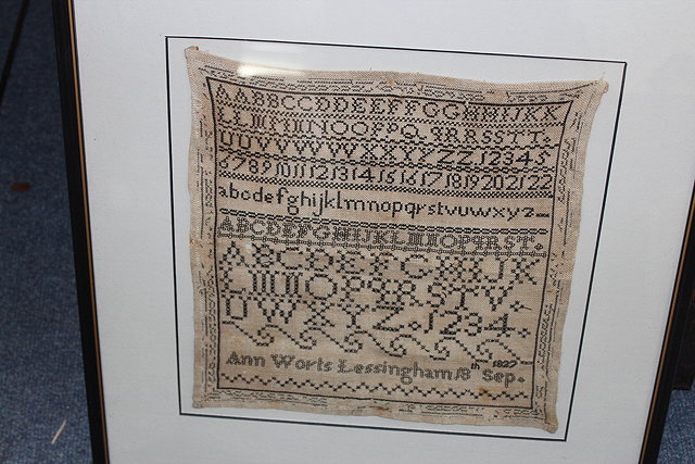 Appraisal: A GEORGIAN ALPHABET SAMPLER worked in black thread signed by