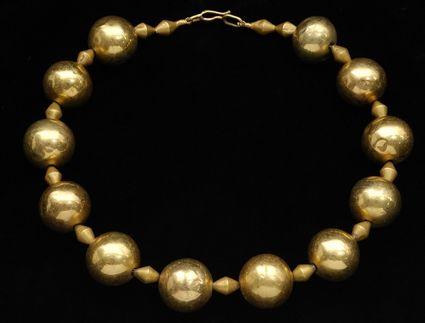 Appraisal: Persian Gold Beads and Biconical Bead Necklace