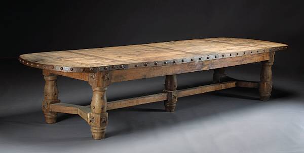 Appraisal: A Baroque style iron mounted walnut refectory table The rectangular