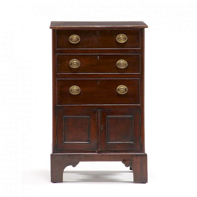 Appraisal: Edwardian Commode late th century mahogany molded top three drawers