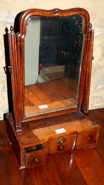 Appraisal: AN ANTIQUE WALNUT VENEERED DRESSING MIRROR with box base fitted