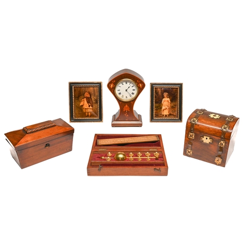 Appraisal: An Edwardian art nouveau inlaid mahogany mantel timepiece with French