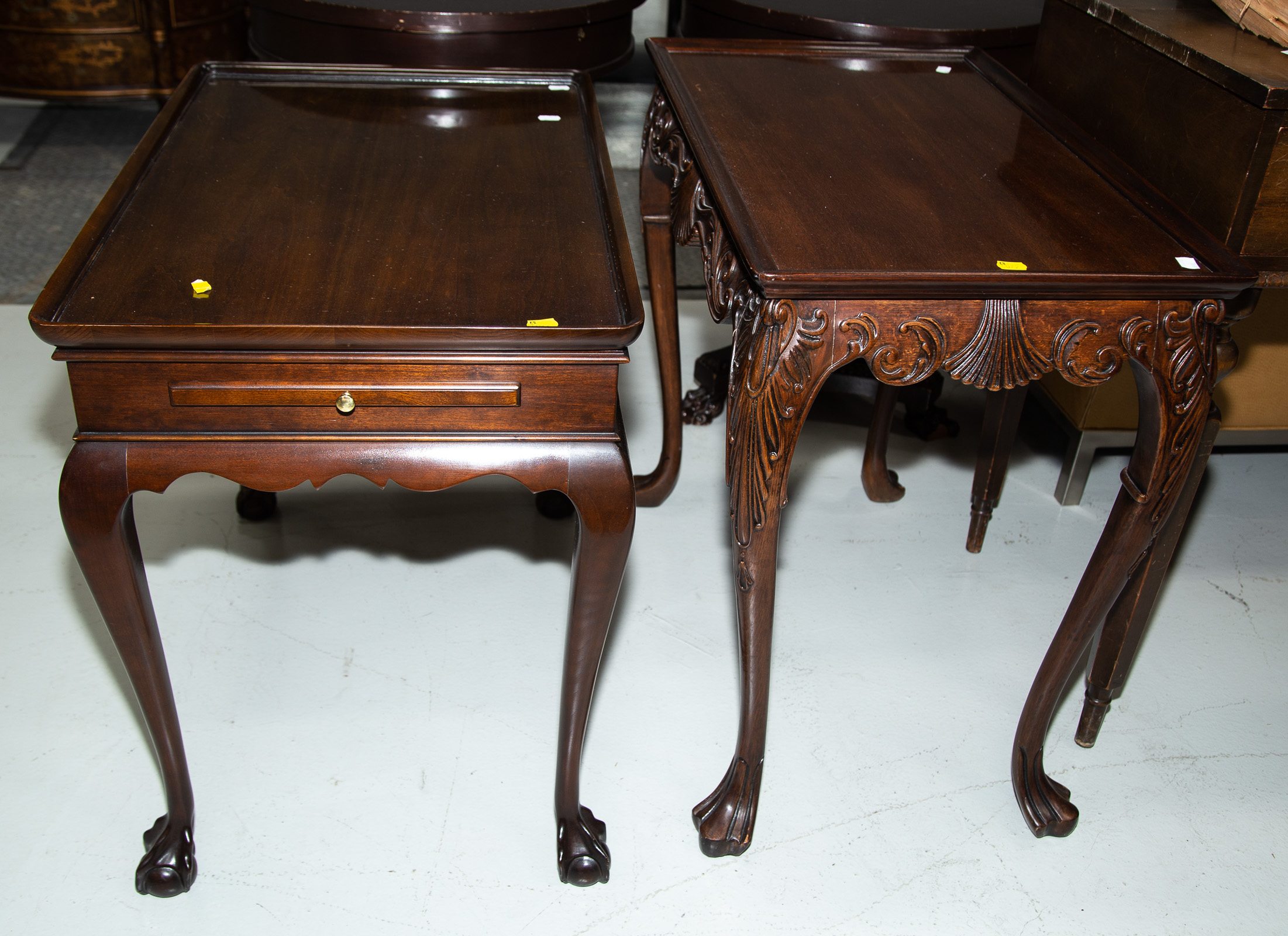 Appraisal: TWO CHIPPENDALE STYLE MAHOGANY END TABLES Comprising a Kittinger cherry