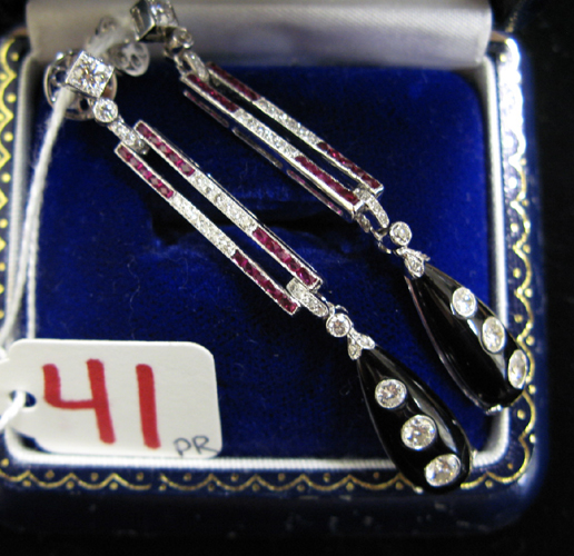 Appraisal: PAIR OF BLACK ONYX DIAMOND RUBY AND EIGHTEEN KARAT WHITE