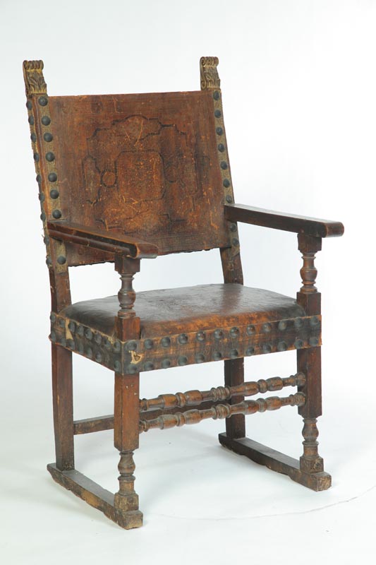 Appraisal: EUROPEAN RENAISSANCE ARMCHAIR Carved detail old worn finish with traces