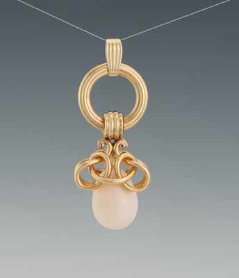 Appraisal: A Ladies' k Gold and Angel Skin Coral Pendant k