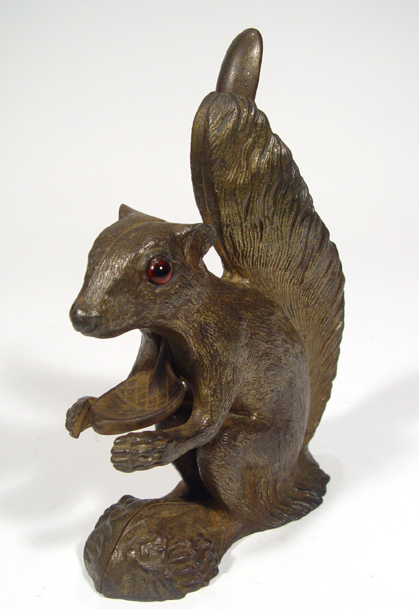 Appraisal: Cast iron squirell nutcracker with sprung loaded tail and glass