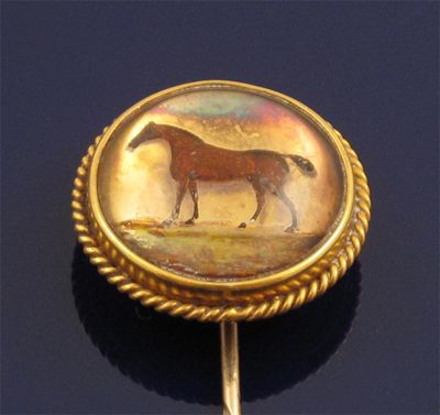 Appraisal: A th Century gold stick pin mounted with a reverse