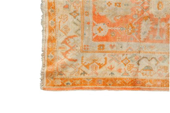 Appraisal: ORIENTAL RUG Persian th century Pale cream and orange geometric