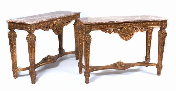 Appraisal: A pair of Louis XVI style carved and gilt decorated