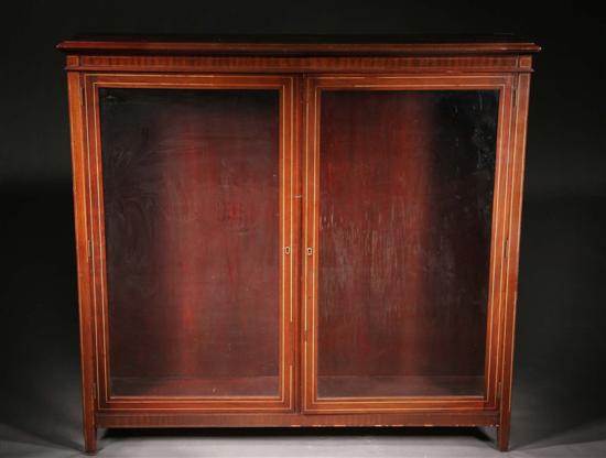 Appraisal: EDWARDIAN CURIO CABINET late th century mahogany Two-door rectangular case