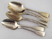 Appraisal: Seven various fiddle pattern silver dessert spoons wt g