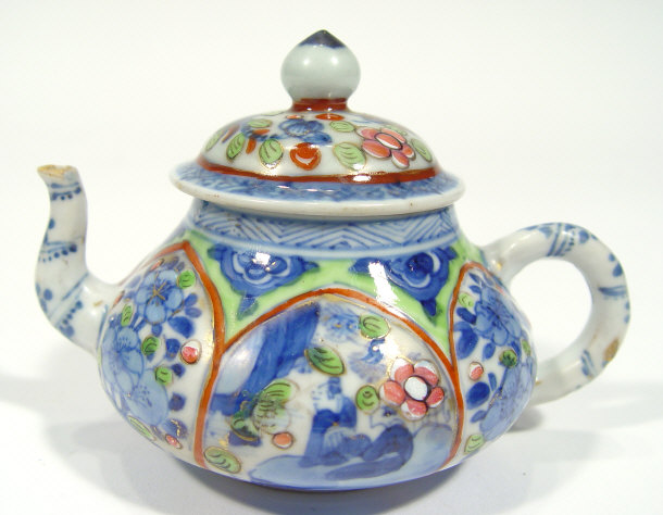 Appraisal: Chinese porcelain squat teapot painted and enamelled in colours with