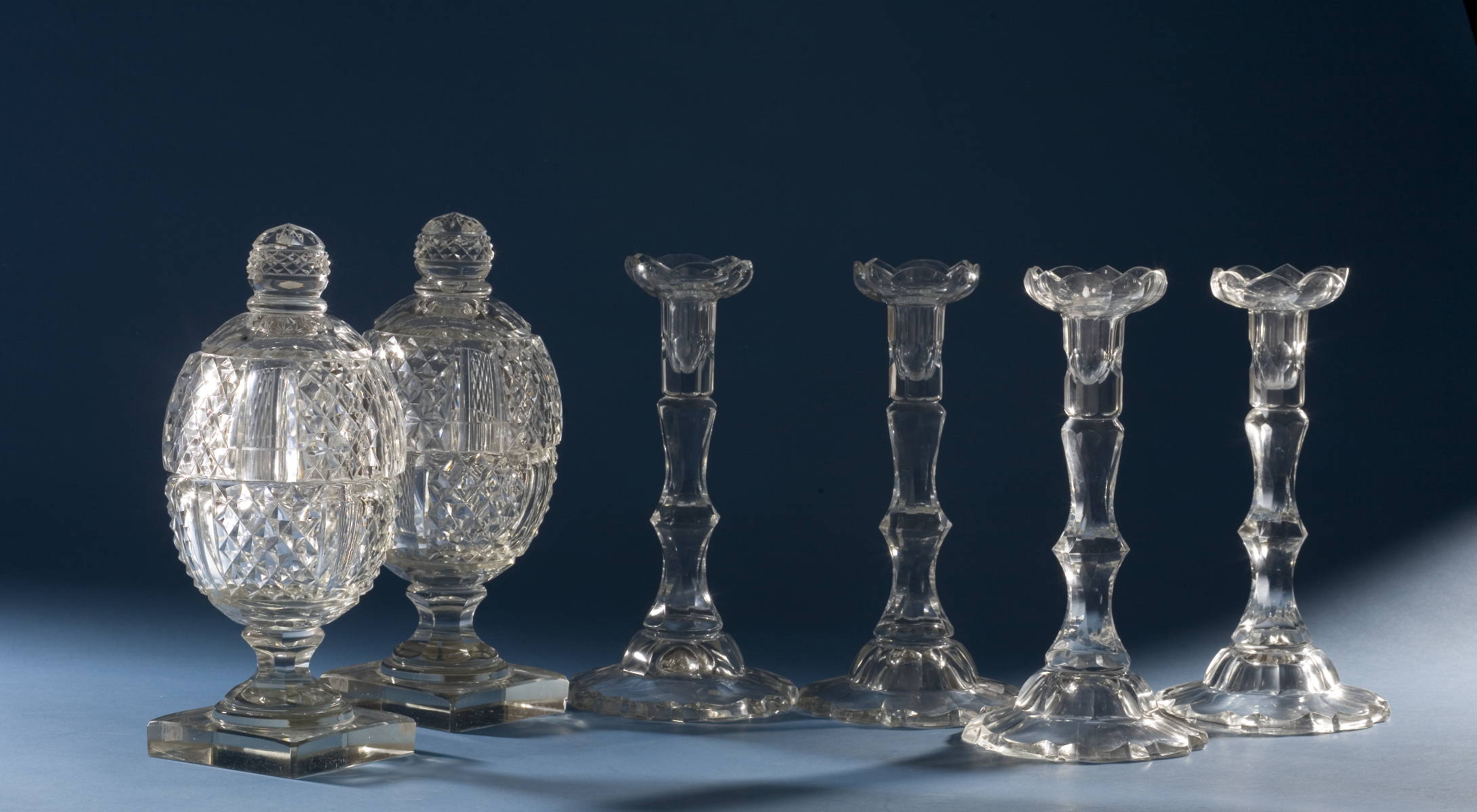 Appraisal: SET OF FOUR ANGLO-IRISH CUT GLASS CANDLESTICKS AND A PAIR