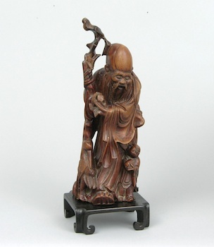 Appraisal: A Chinese Carved Wood Figural Group A Chinese carved wood