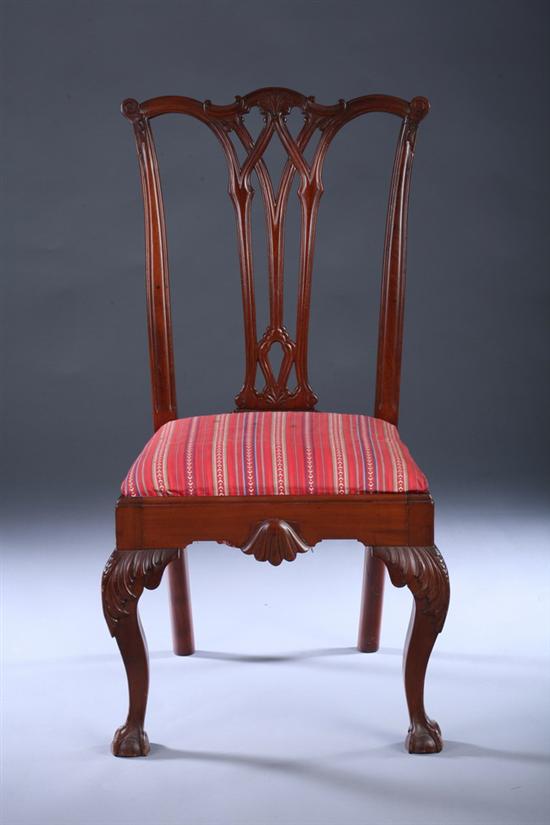 Appraisal: TWO CHIPPENDALE STYLE MAHOGANY DINING CHAIRS th century one side