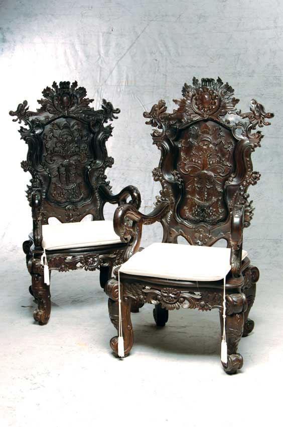 Appraisal: PAIR CHINESE ROSEWOOD CHAIRS Pair Chinese carved rosewood armchairs each