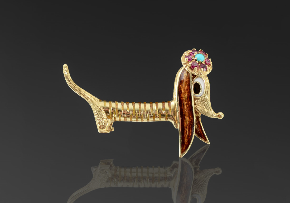 Appraisal: K FIGURAL DACHSHUND DOG PIN K yellow gold stylized dachshund