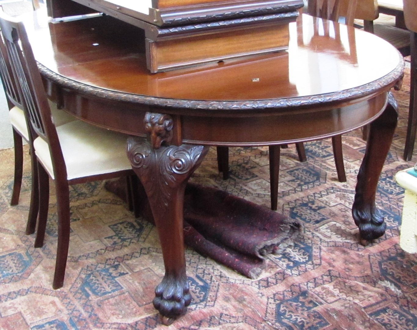 Appraisal: An early th century mahogany oval extending dining table the