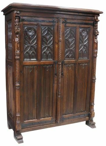 Appraisal: French Gothic Revival oak cupboard th c molded cornice two