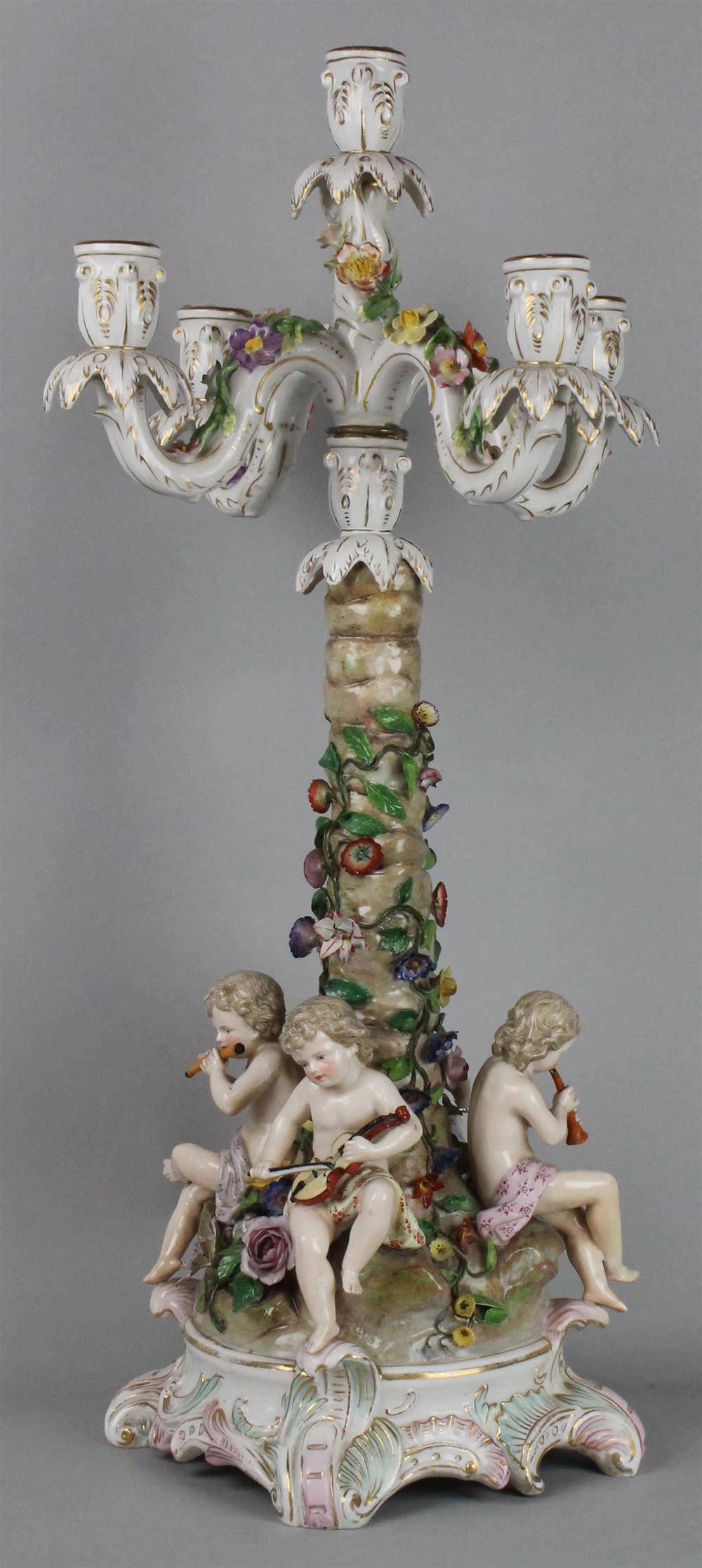 Appraisal: DRESDEN STYLE FIVE LIGHT CANDLELABRA WITH CHERUBS probably Thuringian late