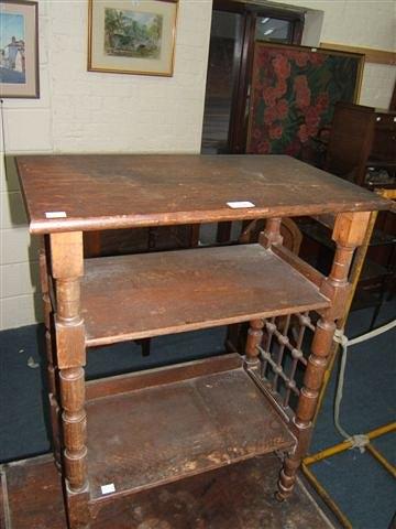 Appraisal: A Liberty style two tier oak table wide