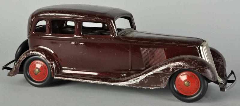 Appraisal: Pressed Steel Cor-Cor Sedan Automobile Push Toy Description American Marked