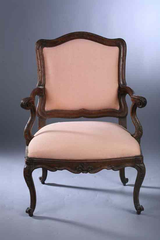 Appraisal: LOUIS XV STYLE CARVED MAHOGANY FAUTEUIL th century later salmon-color