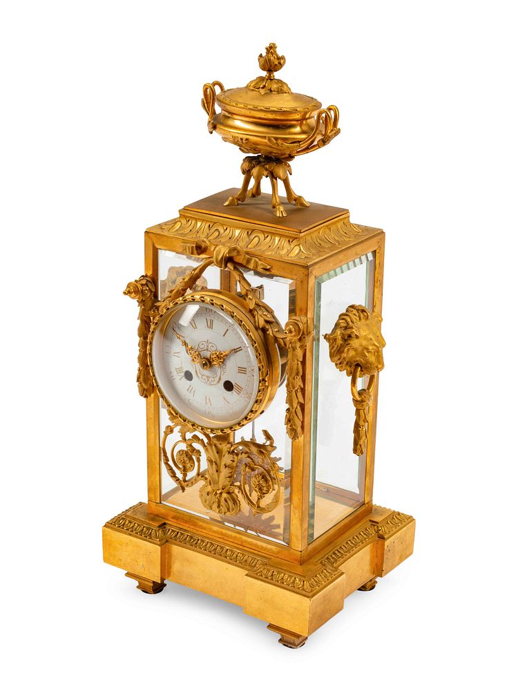 Appraisal: A French Gilt Bronze Mantel Clock A French Gilt Bronze