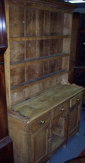 Appraisal: A th Century pine dresser with shelves over fitted drawers