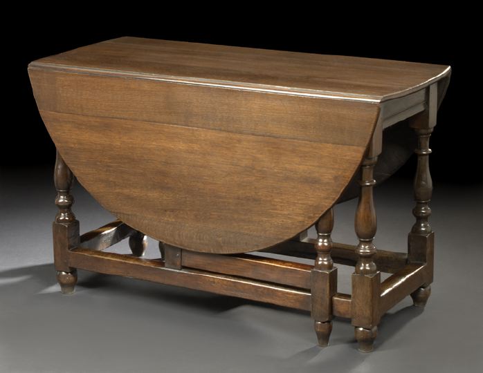 Appraisal: English Oak Drop-Leaf Table early th century the rectangular top