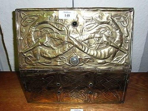 Appraisal: AN ARTS AND CRAFTS EMBOSSED BRASS CASKET with all over