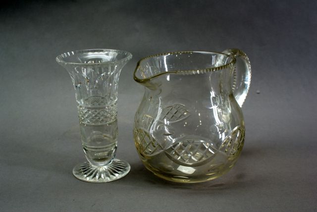 Appraisal: A panel and diamond cut water jug together with a