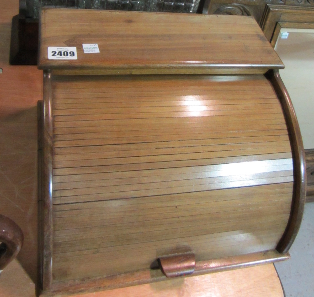 Appraisal: An early th century mahogany stationery box with tambour front