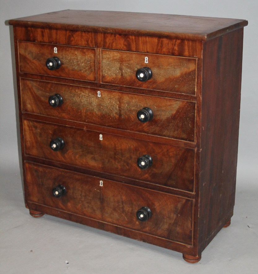 Appraisal: A thC mahogany chest the overhanging cross banded top raised