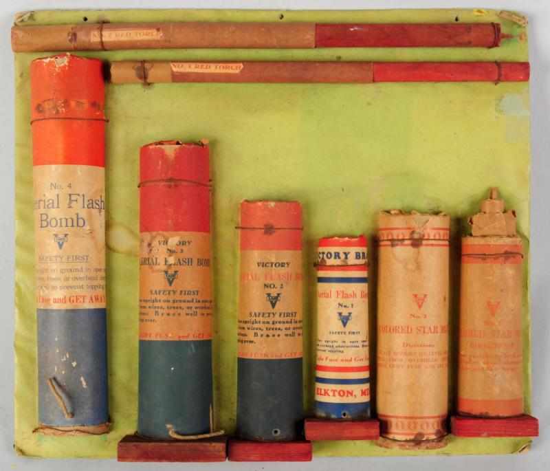 Appraisal: Salesman's Sample Firecracker Board Includes eight pieces of Victory aerial