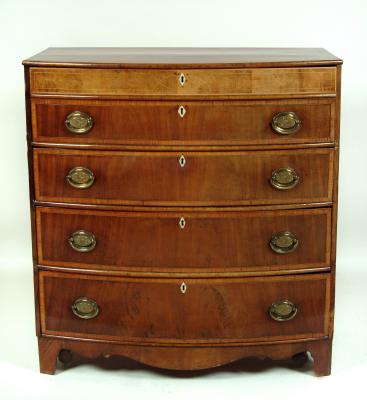 Appraisal: A GEORGE III MAHOGANY CHEST th century of bowed form