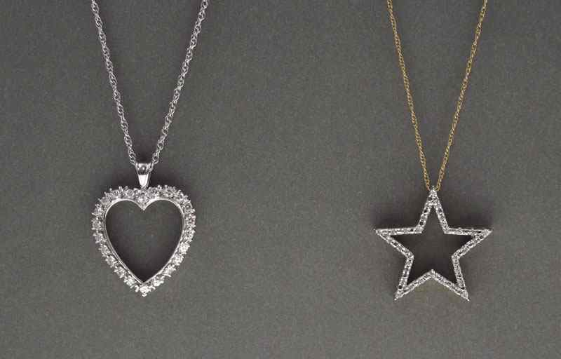 Appraisal: TWO K DIAMOND NECKLACES K white gold HEART pendant contains