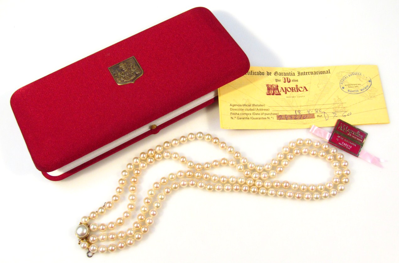 Appraisal: A double strand of Majorcan pearls each uniform and centred