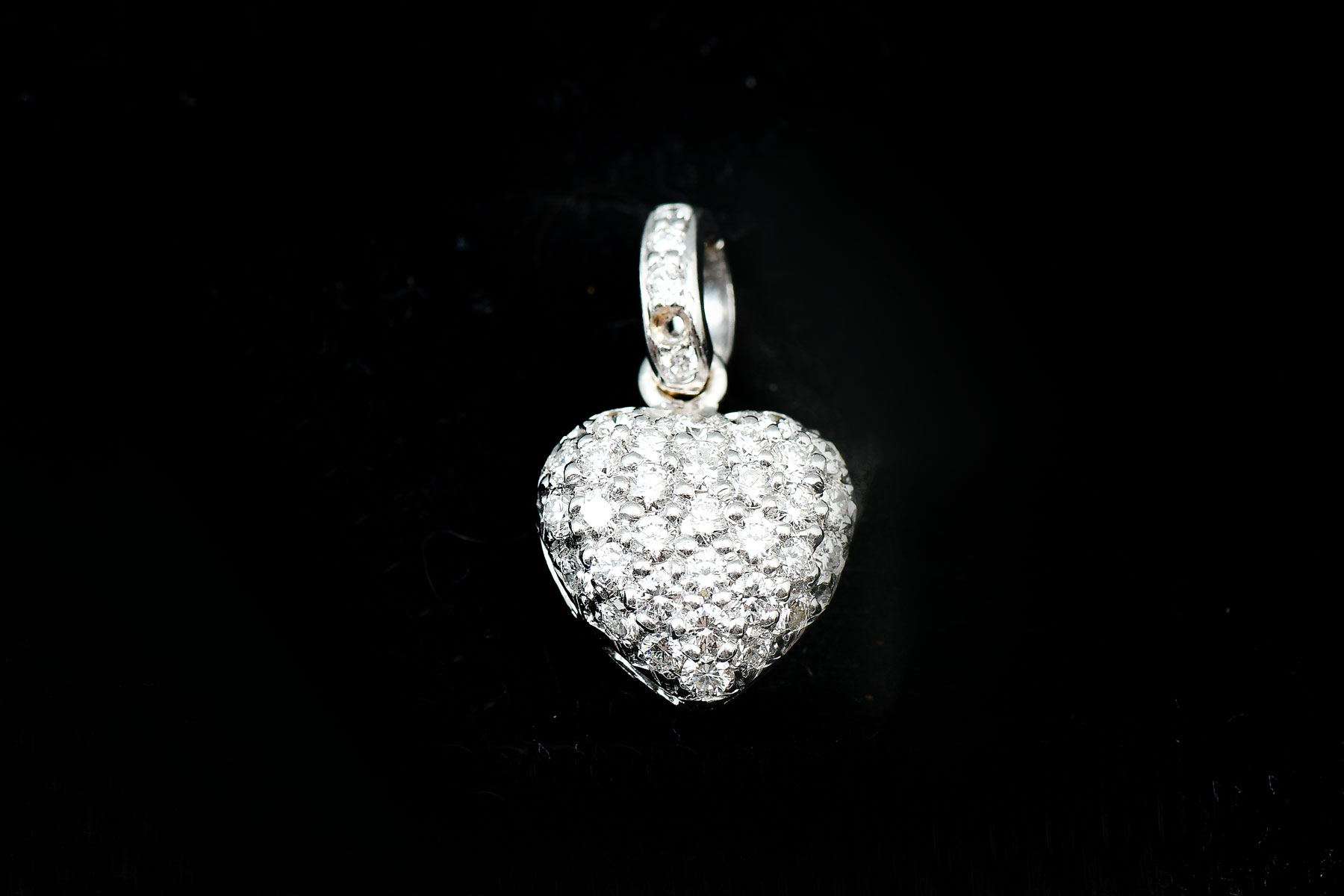 Appraisal: K CTW DIAMOND PENDANT round brilliant cut diamonds are pave