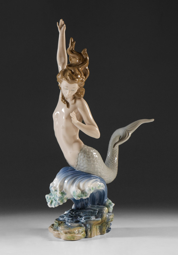 Appraisal: LLADRO PORCELAIN FIGURINE MERMAID ON WAVE Vincente Martinez sculptor issued