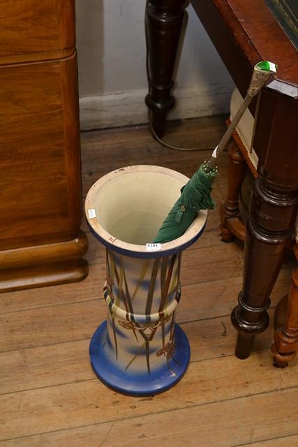 Appraisal: AN ART NOUVEAU STYLE UMBRELLA STAND WITH VICTORIAN UMBRELLA