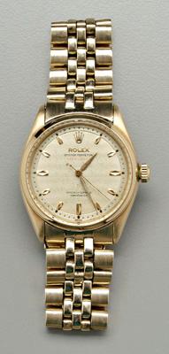 Appraisal: Man's gold Rolex wristwatch silver dial with gold markers Rolex