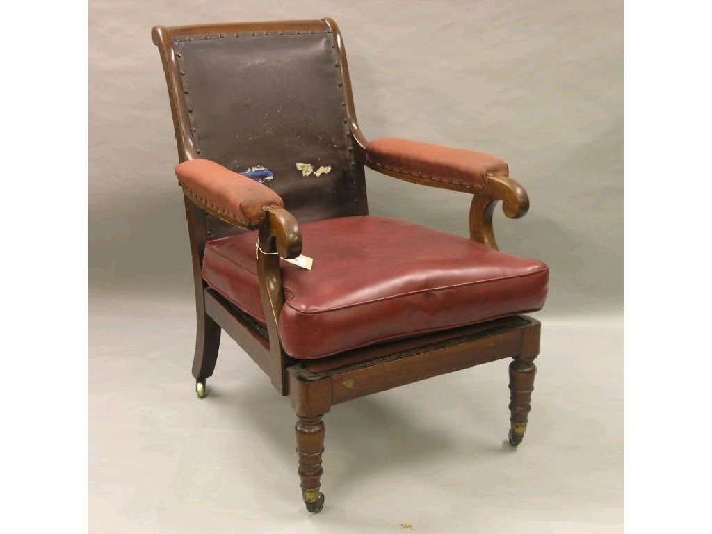 Appraisal: An early Victorian mahogany library armchair on front turned and