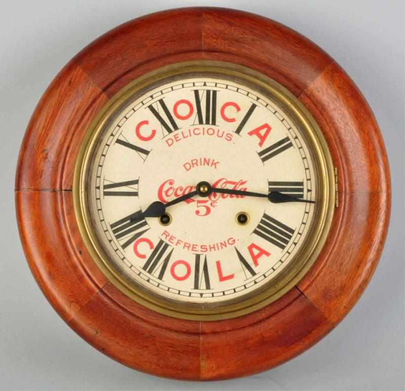 Appraisal: Coca-Cola Gallery Clock Clock is circa to and the face