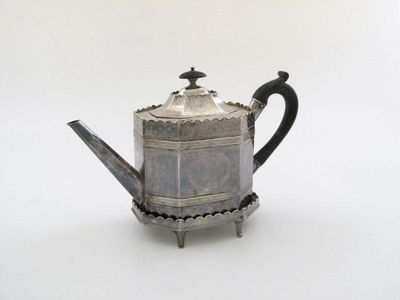 Appraisal: A George III old Sheffield plated tea pot and stand