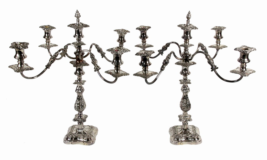 Appraisal: A pair of th Century silver plated candelabra each with